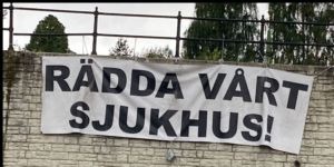 Bild av banderoll med orden "Rädda vårt sjukhus!"